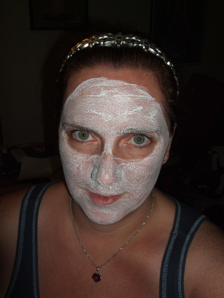 Woman with cosmetic amsk