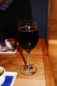 A bottle of wine in a glass